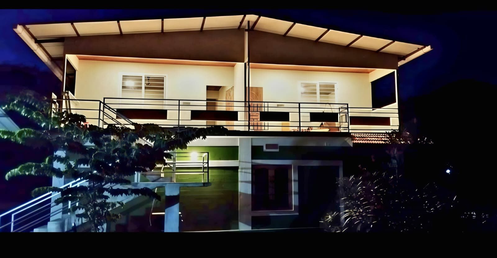 Green View Homestay lit up in the evening